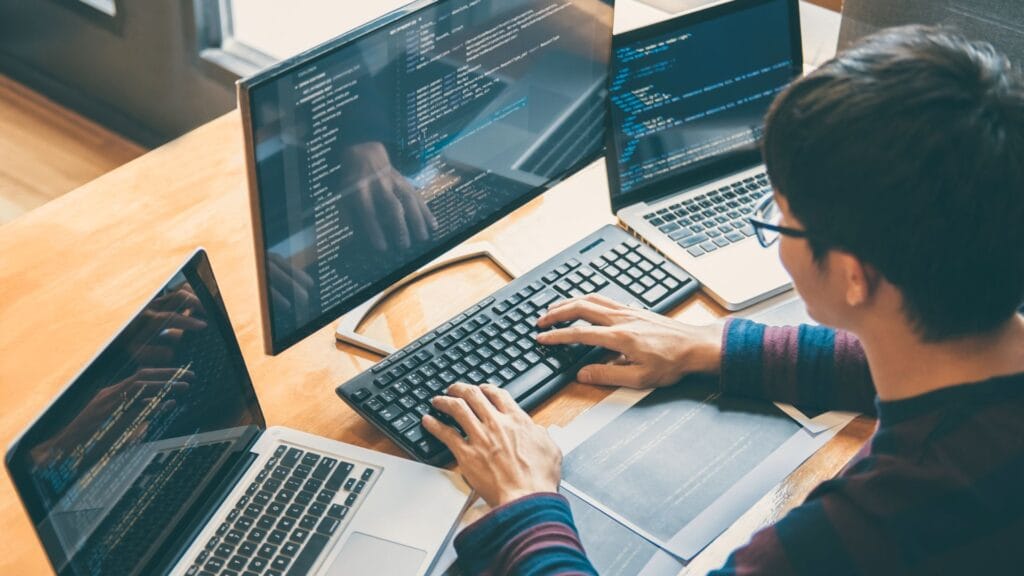software developer working on computer